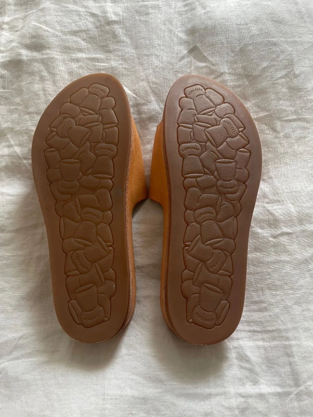 Kork-Ease Tutsi tan buckle slide sandals with natural cork buckle and footbed